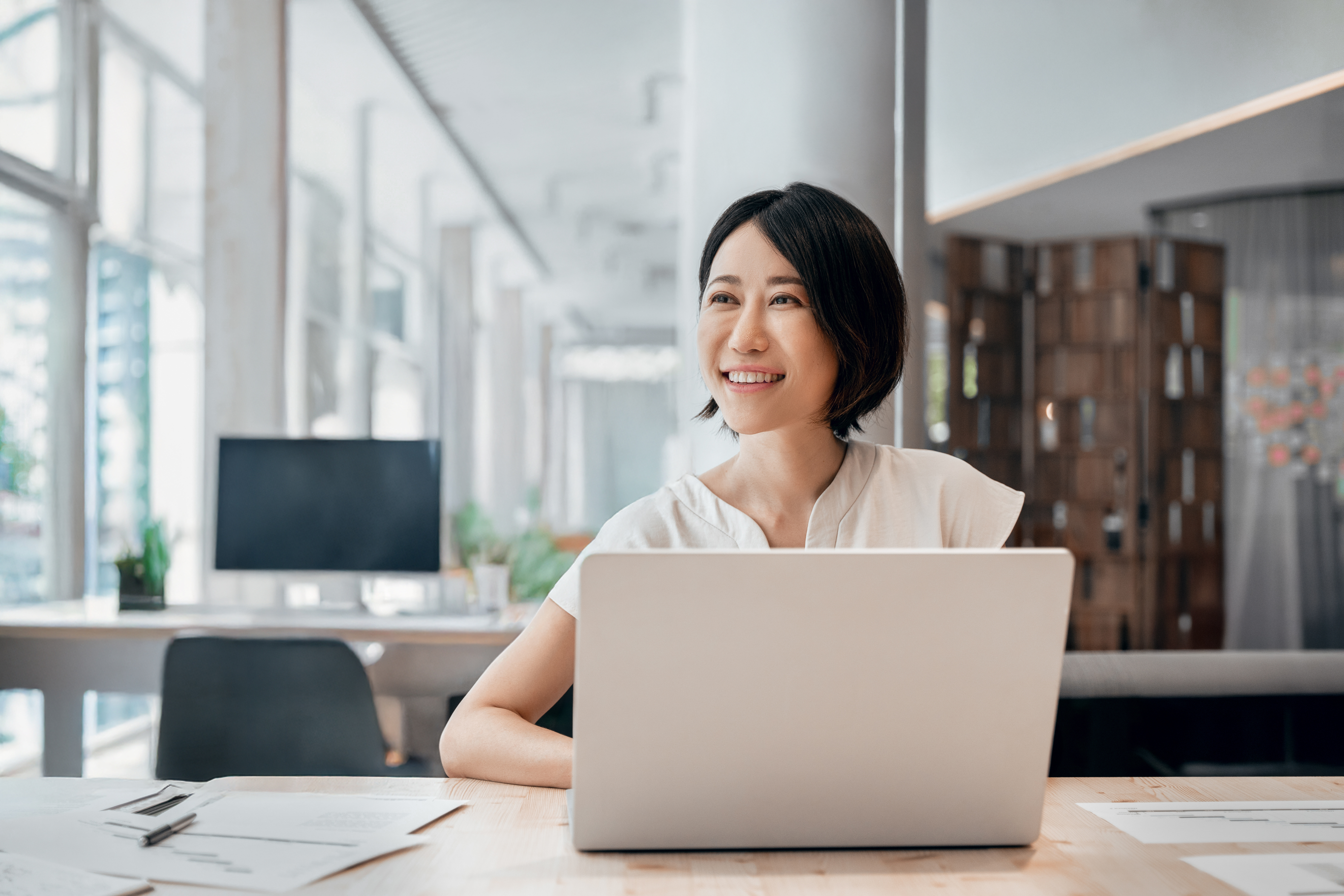 Confident business professional looking forward with satisfaction